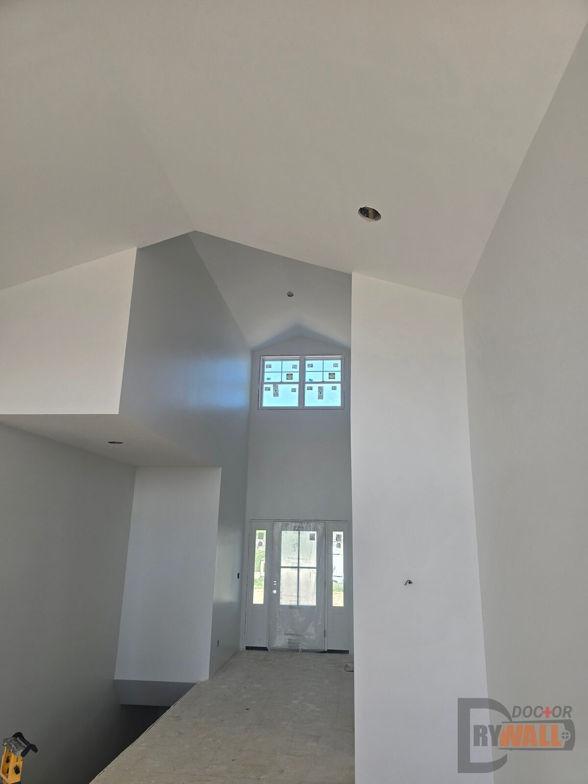Finished vaulted foyer drywalled by Dr. Drywall
